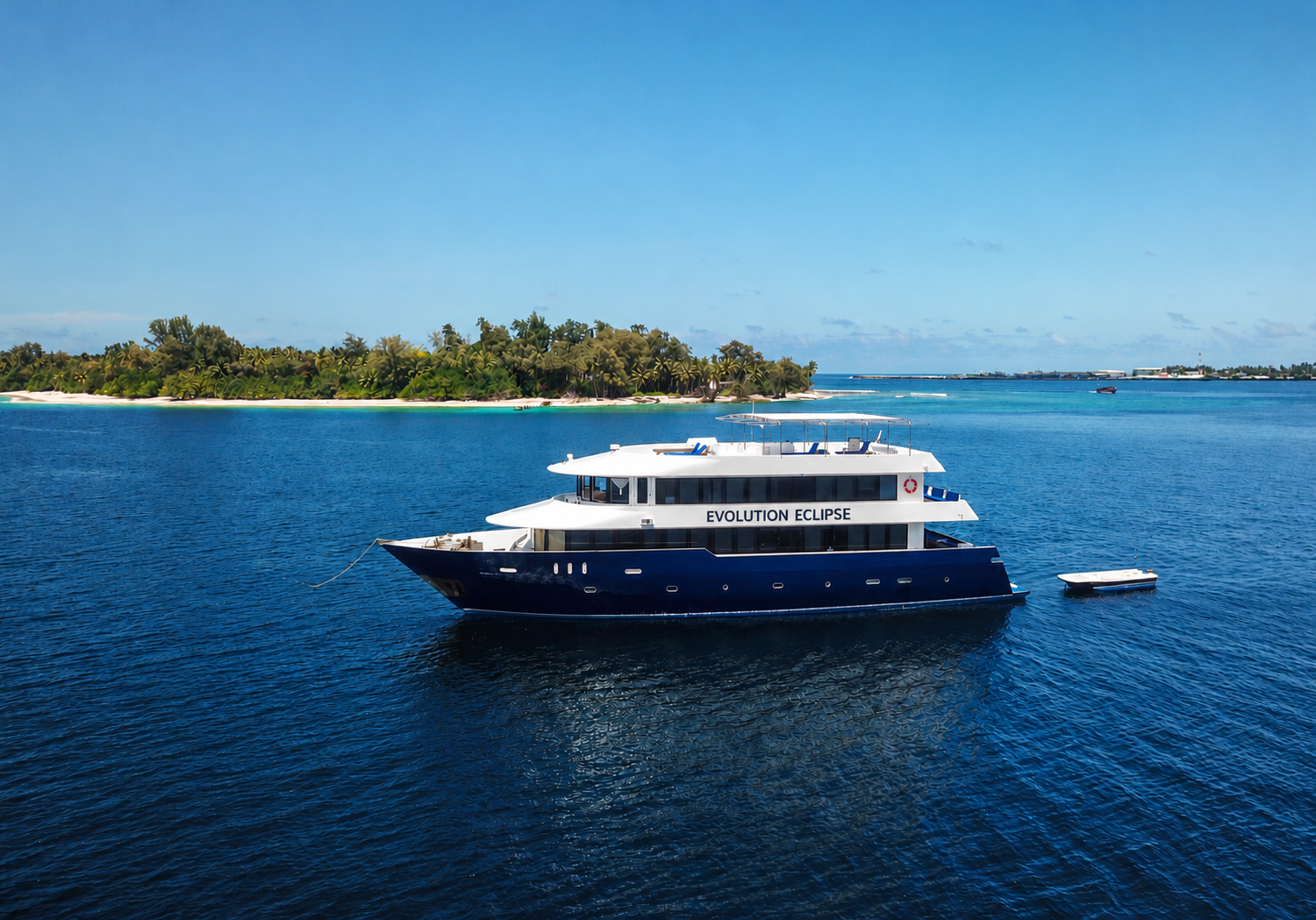 Evolution Eclipse liveaboard anchored in the Maldives